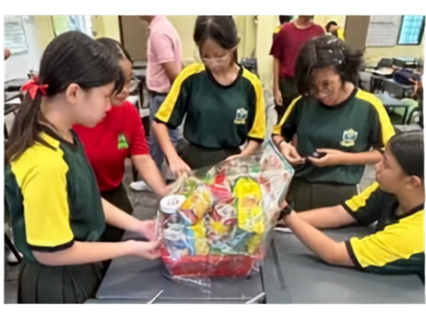 Each class contributed food items to create uniquely designed hampers, which were distributed to the elderly in need within the Khatib community during Chinese New Year, spreading festive cheer and care.